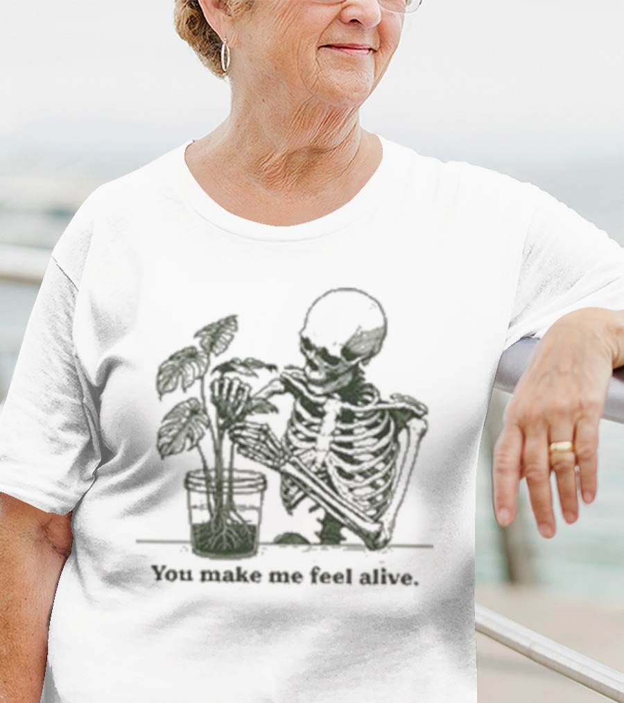 Skeleton Embracing Green Plant With 'You Make Me Feel Alive' Text T-Shirt