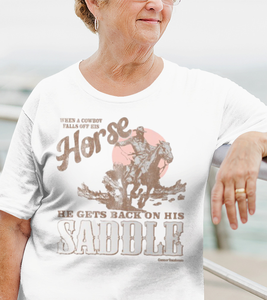 When A Cowboy Falls Off His Horse He Gets Back On His Saddle T-Shirt