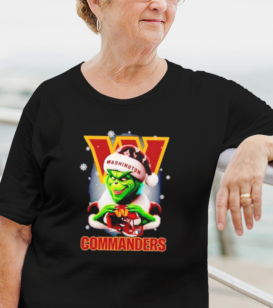 The Grinch Wearing Santa Hat Holding Gift For Washington Commanders Christmas T-Shirt