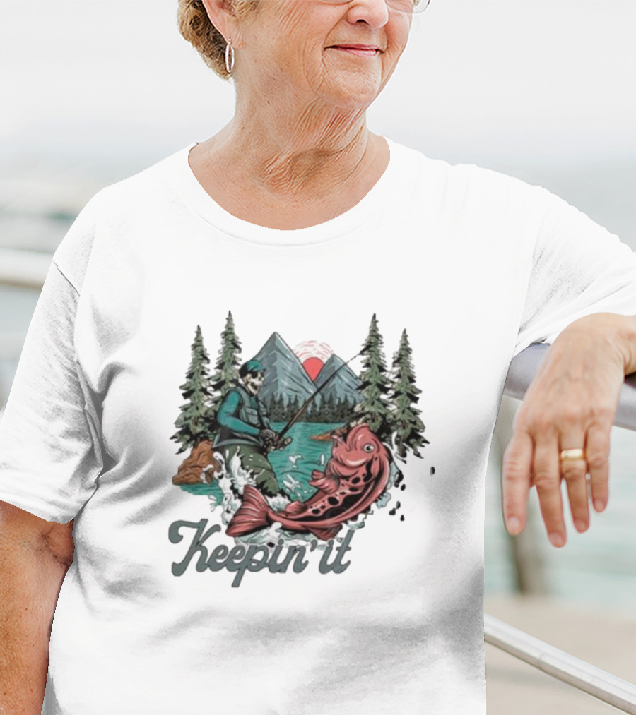 Keepin' It Reel Skeleton Fishing Adventure With Giant Fish And Mountain Lake Scene T-Shirt