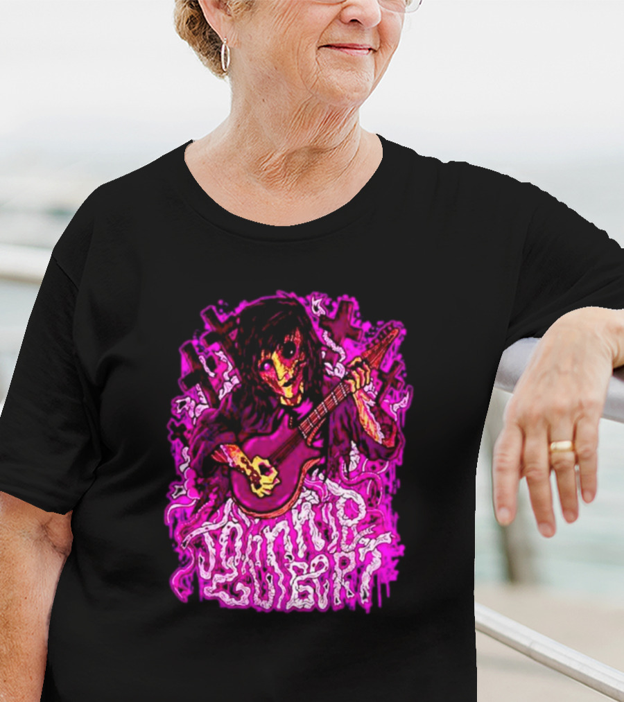 Zombie Johnnie Guilbert Playing Guitar With Purple Light And Crosses Background T-Shirt