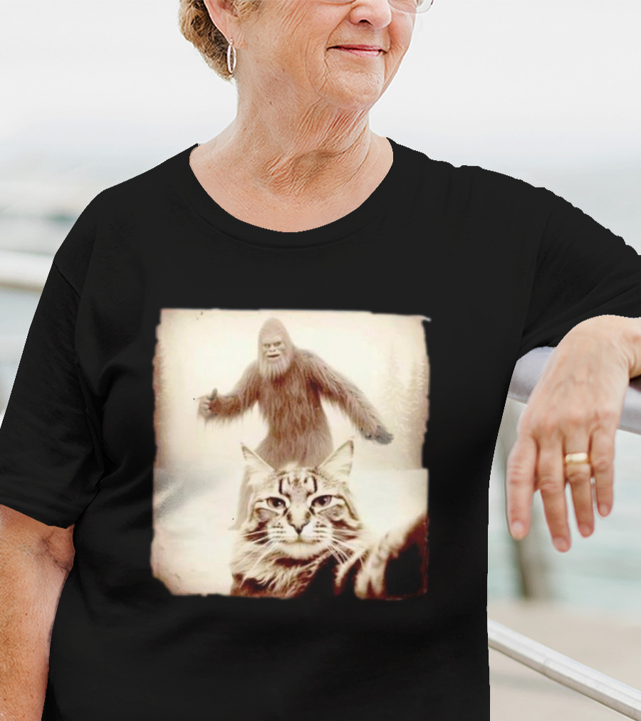 Cat Taking Selfie With Bigfoot In Snowy Forest Scene T-Shirt