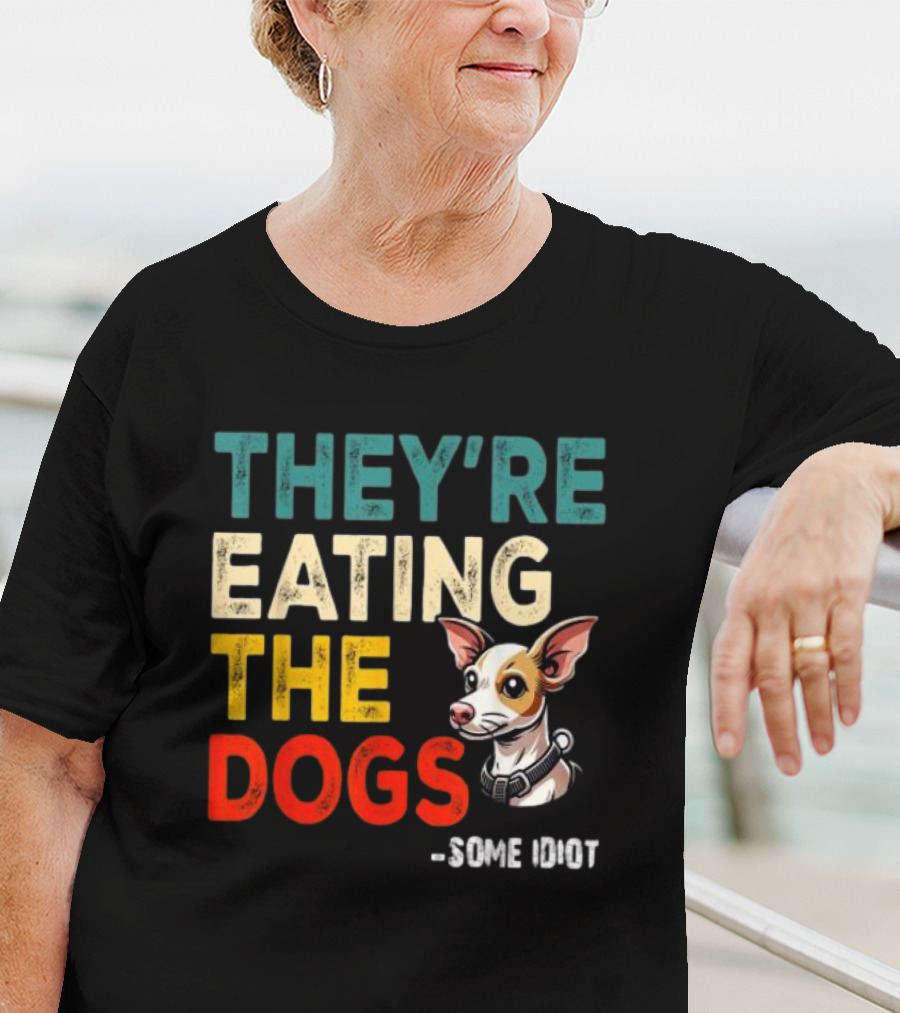 THEY’RE EATING THE DOGS - SOME IDIOT T-Shirt