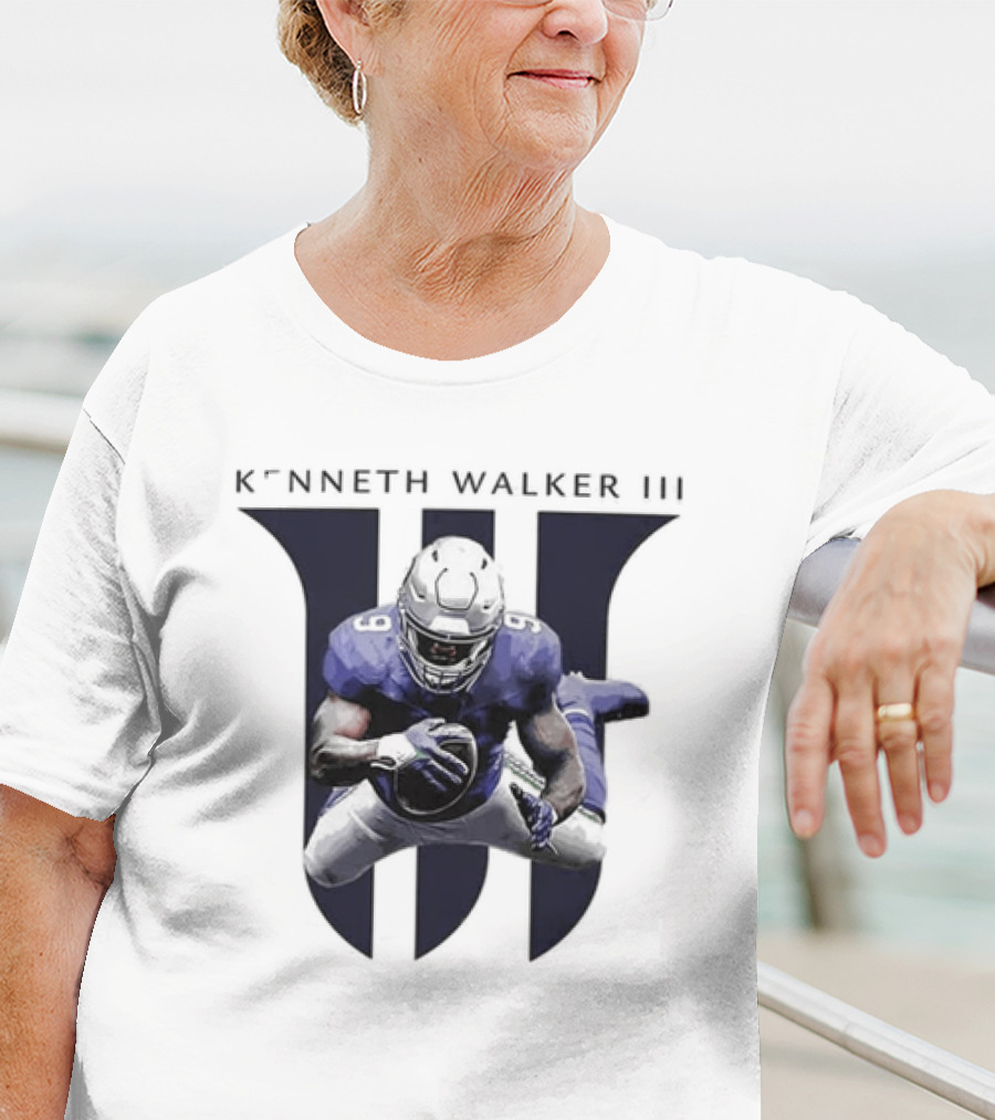 Kenneth Walker III Football Jump In Blue Uniform T-Shirt