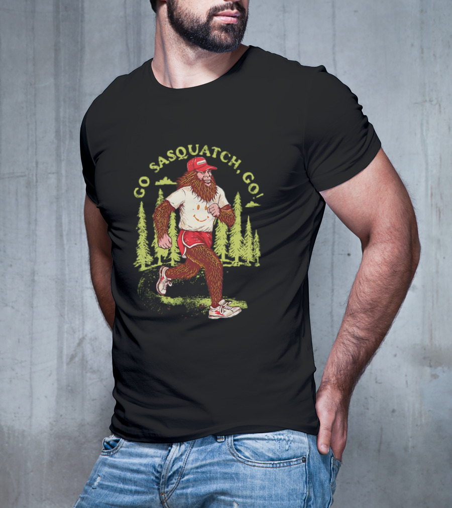 Go Sasquatch Go Bigfoot Jogging In Forest With Red Cap And Sneakers T-Shirt