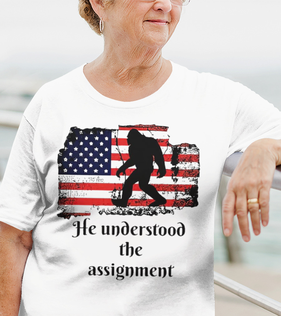 Bigfoot Silhouette With Distressed American Flag He Understood The Assignment T-Shirt