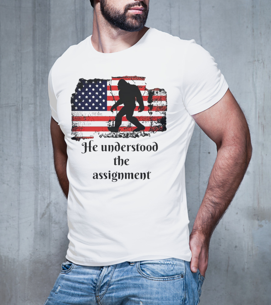 Bigfoot Silhouette With Distressed American Flag He Understood The Assignment T-Shirt