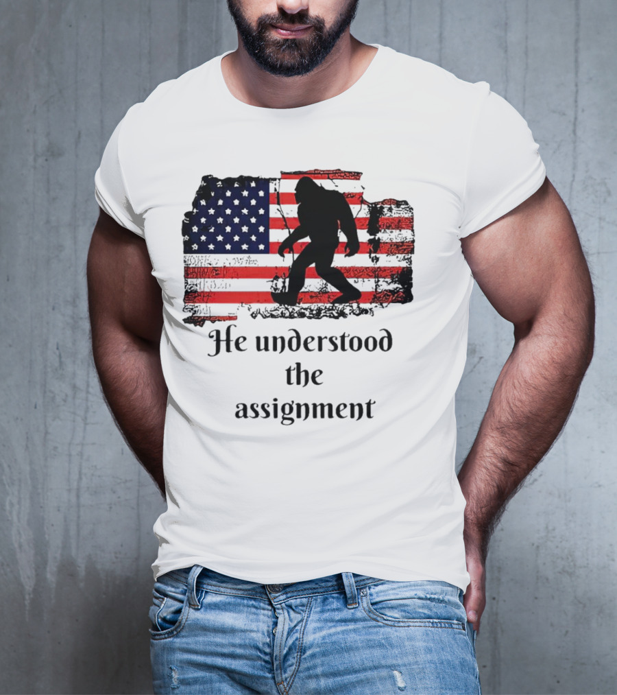 Bigfoot Silhouette With Distressed American Flag He Understood The Assignment T-Shirt