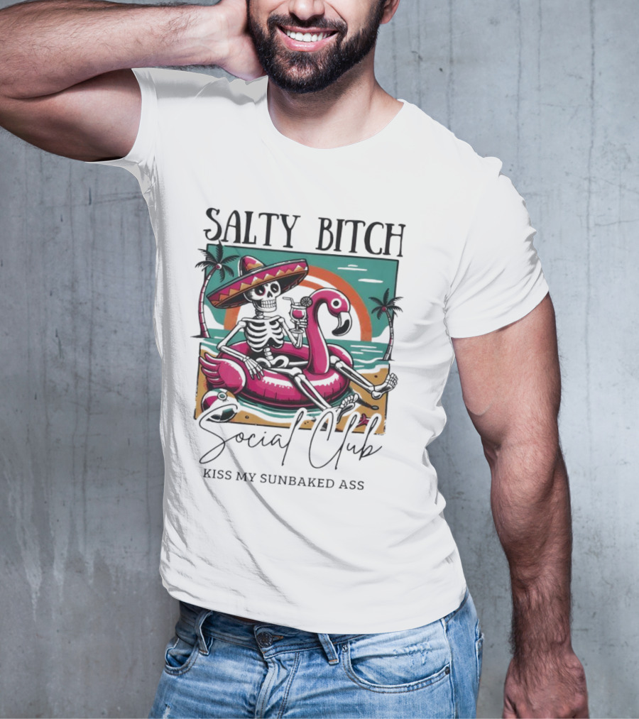Salty Bitch Skeleton On Flamingo Float In Sunset Beach Scene With Kiss My Sunbaked Ass Text T-Shirt