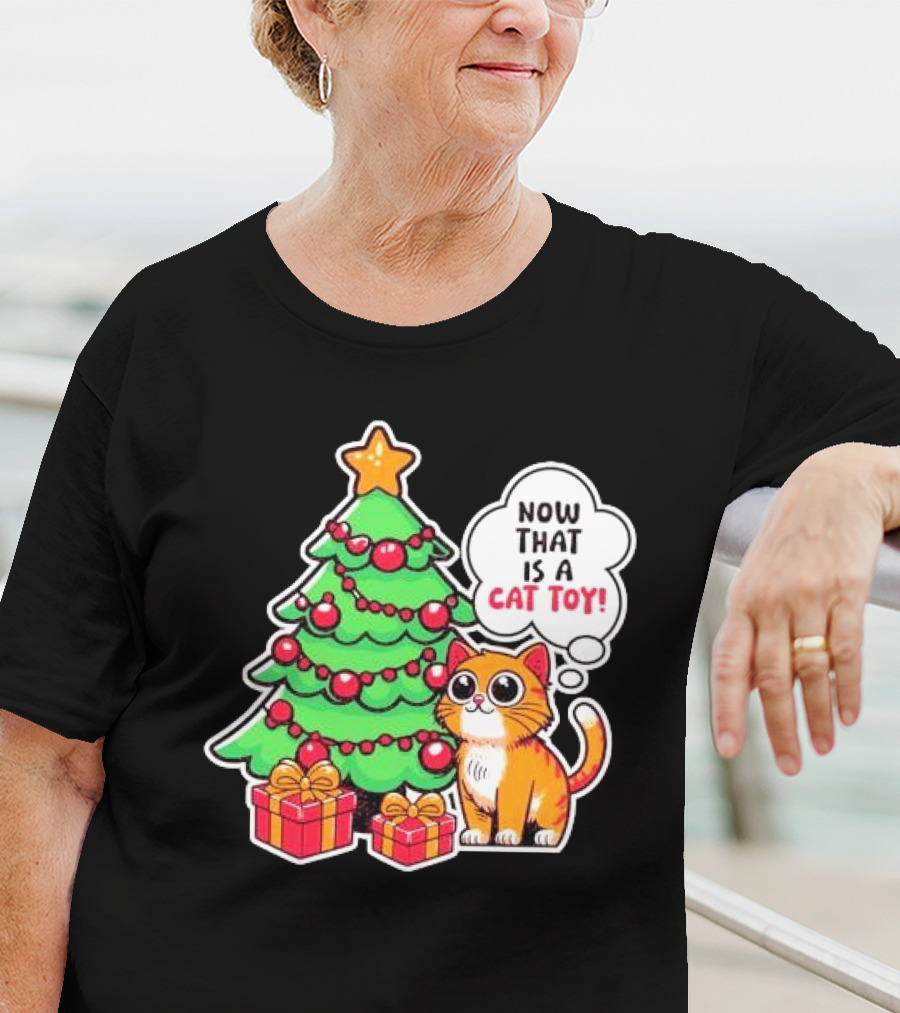 Now That Is A Cat Toy A Cute Orange Cat With Wide Eyes Next To Decorated Christmas Tree T-Shirt