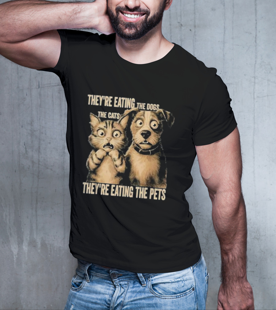 THEY'RE EATING THE DOGS THE CATS THEY'RE EATING THE PETS T-Shirt
